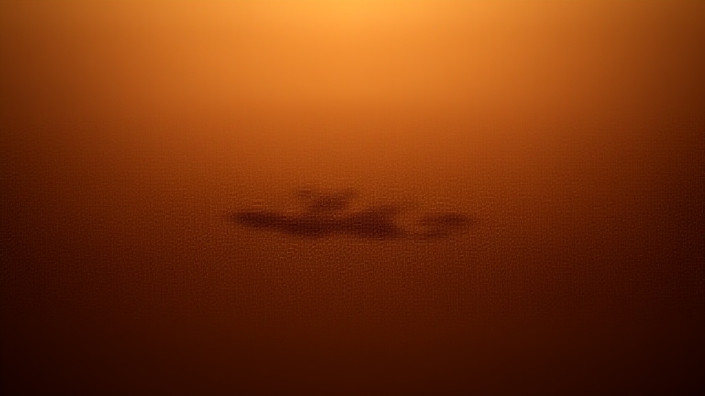 A paw print in soft sand at golden hour.